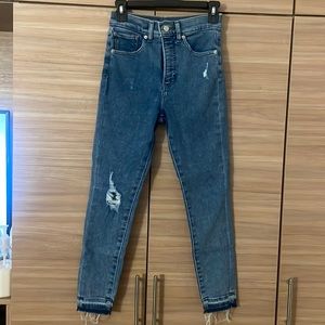 Express jeans, skinny high rise, distressed look. Size 0